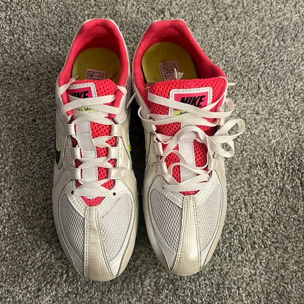 Multi use track and field spikes. Multi color size 7.5 women’s.
